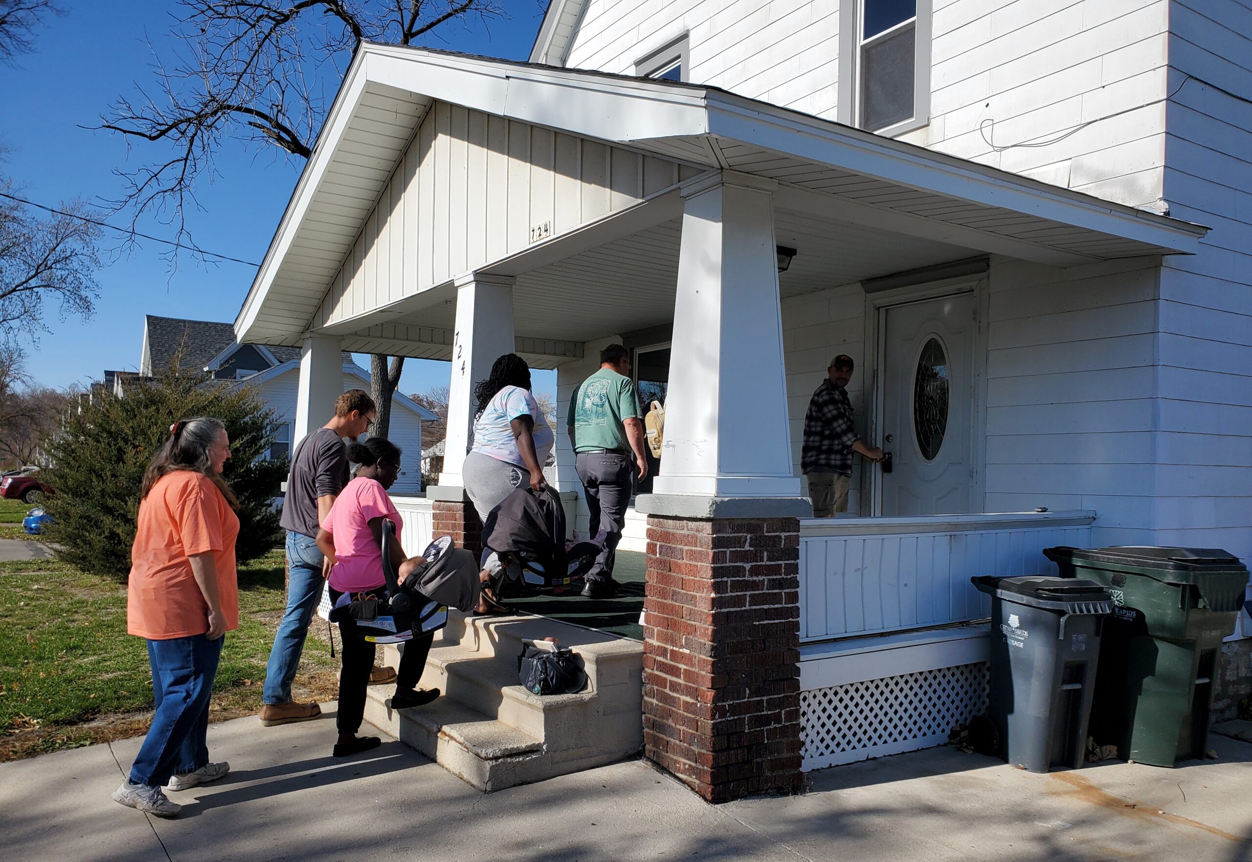 visitors entering rental home