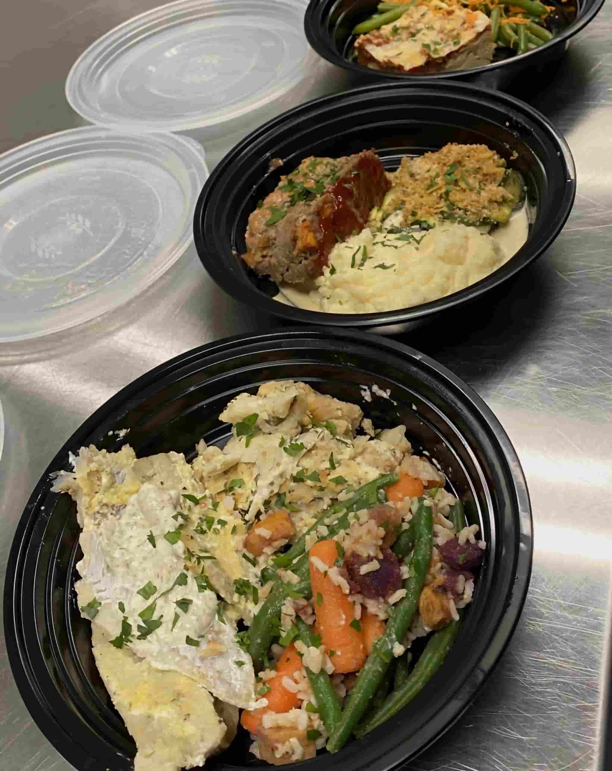 Image of Good Meals To Go, healthy meals for $5 or less in take out containers, available at the Cultivate Hope Corner Store